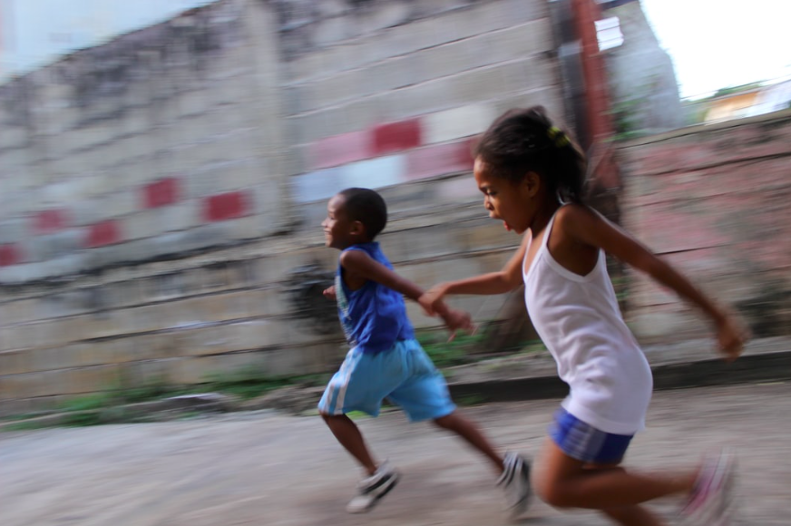 two children running fast